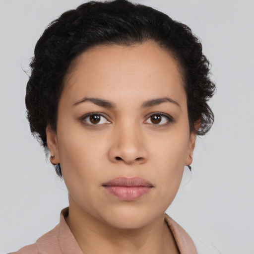 Joyful asian young-adult female with short  black hair and brown eyes