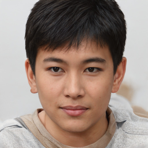 Neutral asian child male with short  brown hair and brown eyes