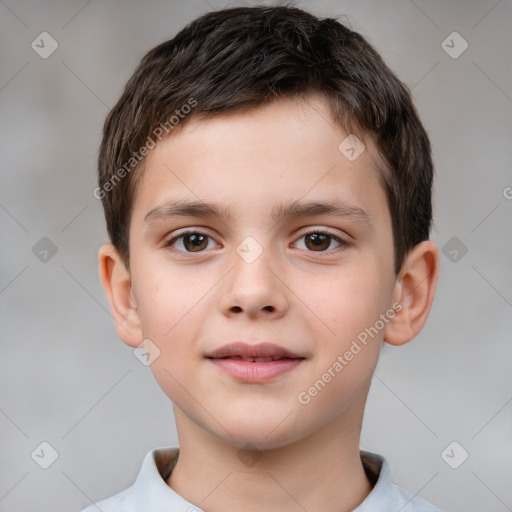 Joyful white child male with short  brown hair and brown eyes