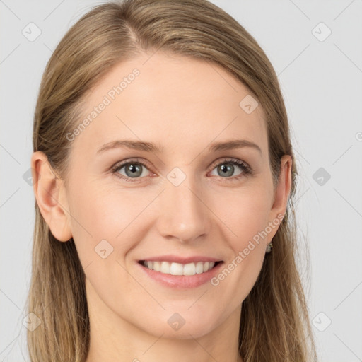 Joyful white young-adult female with long  brown hair and grey eyes