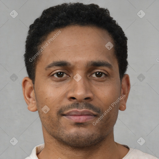 Neutral latino young-adult male with short  brown hair and brown eyes