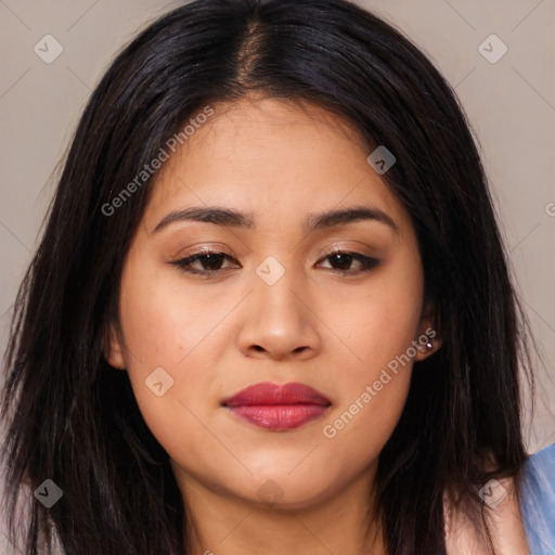 Joyful latino young-adult female with long  brown hair and brown eyes