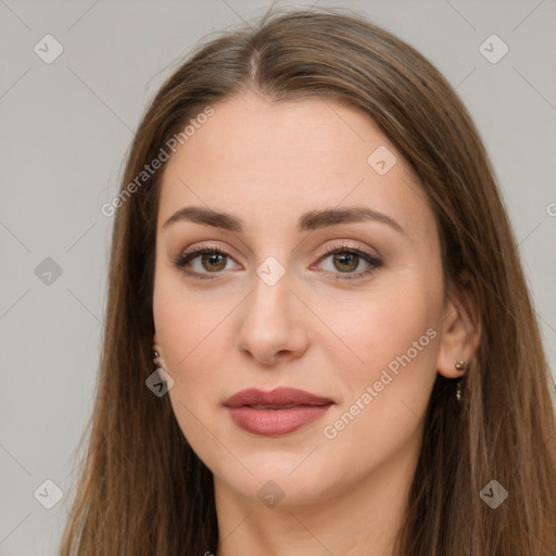 Joyful white young-adult female with long  brown hair and brown eyes