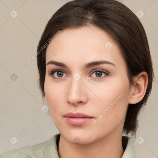 Neutral white young-adult female with medium  brown hair and brown eyes