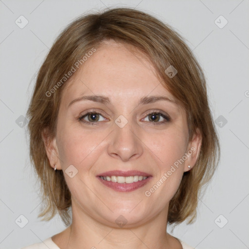 Joyful white adult female with medium  brown hair and grey eyes