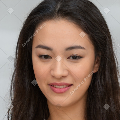 Joyful asian young-adult female with long  brown hair and brown eyes