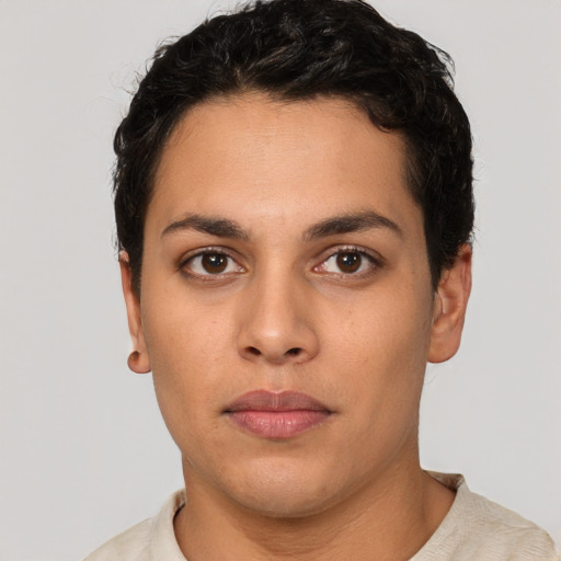 Neutral white young-adult female with short  black hair and brown eyes