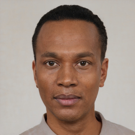 Neutral black young-adult male with short  black hair and brown eyes
