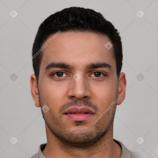 Neutral white young-adult male with short  black hair and brown eyes
