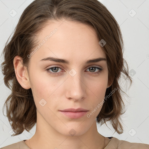 Neutral white young-adult female with medium  brown hair and grey eyes