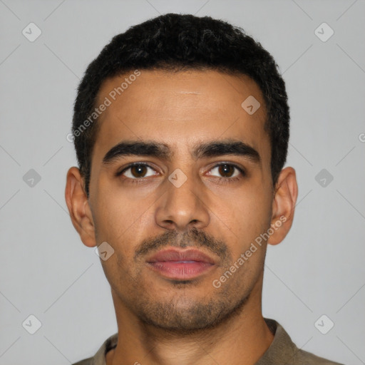 Neutral latino young-adult male with short  black hair and brown eyes