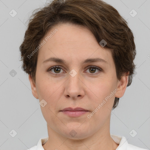 Joyful white adult female with short  brown hair and brown eyes