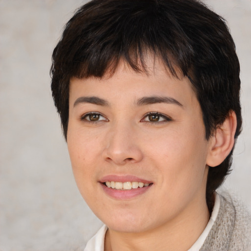 Joyful white young-adult female with short  brown hair and brown eyes