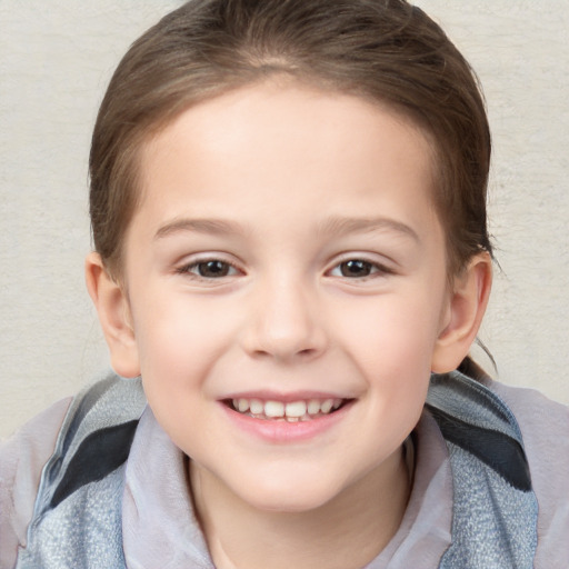 Joyful white child female with medium  brown hair and brown eyes