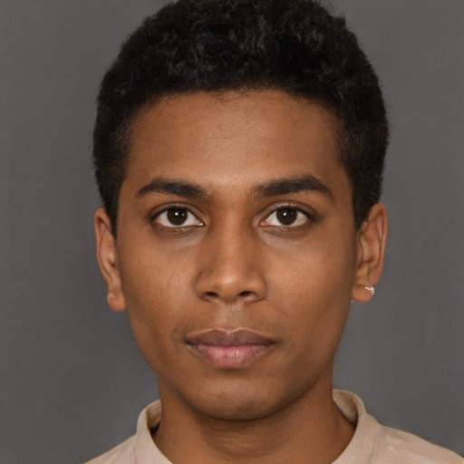 Neutral black young-adult male with short  black hair and brown eyes