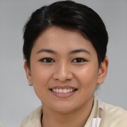 Joyful asian young-adult female with short  brown hair and brown eyes