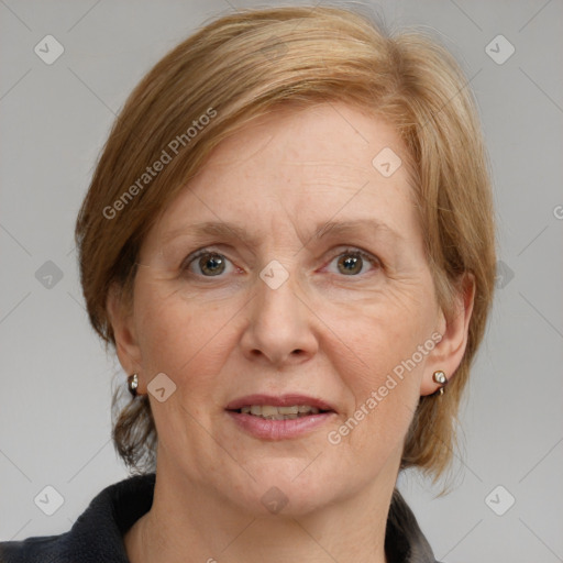 Joyful white adult female with medium  brown hair and blue eyes