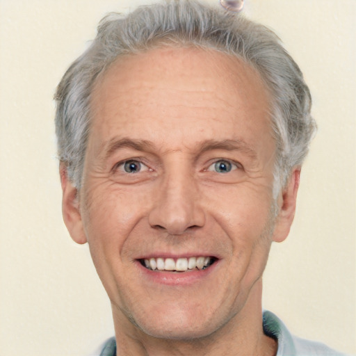 Joyful white middle-aged male with short  gray hair and brown eyes