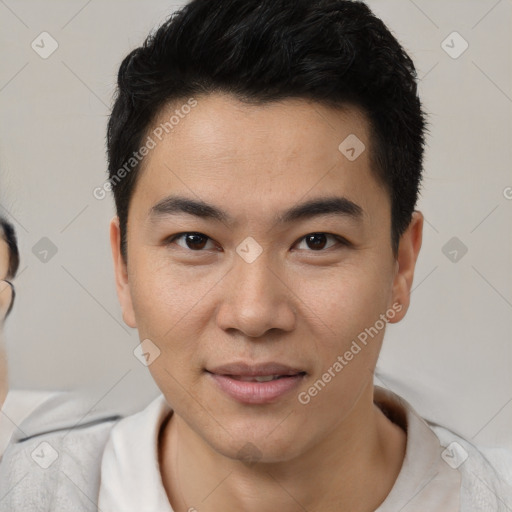 Joyful latino young-adult male with short  black hair and brown eyes