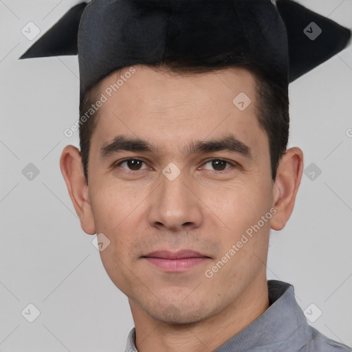 Joyful white young-adult male with short  black hair and brown eyes