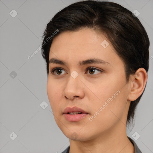 Neutral white young-adult female with medium  brown hair and brown eyes