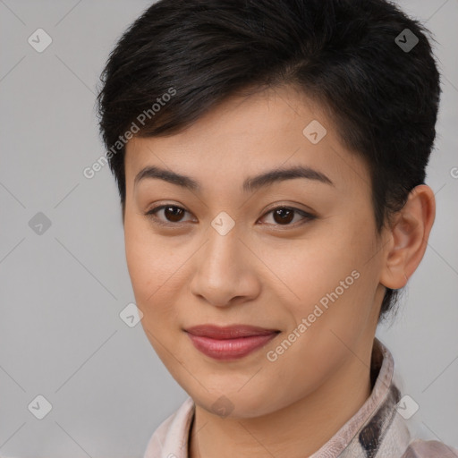 Joyful asian young-adult female with short  brown hair and brown eyes