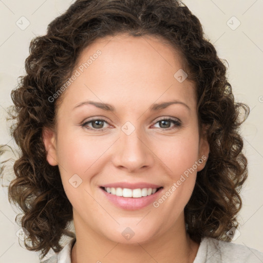 Joyful white young-adult female with medium  brown hair and green eyes