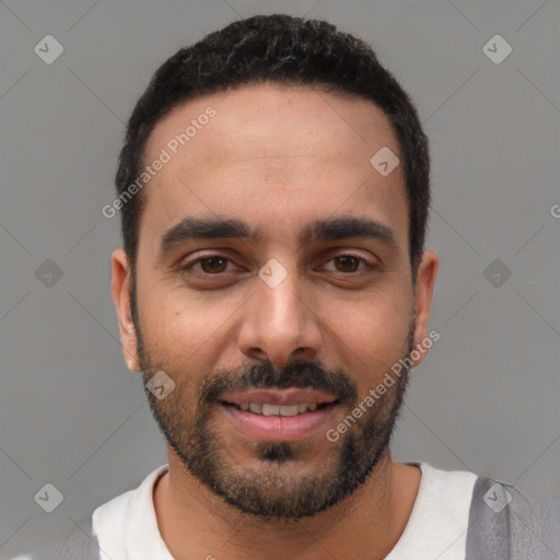 Joyful white young-adult male with short  black hair and brown eyes