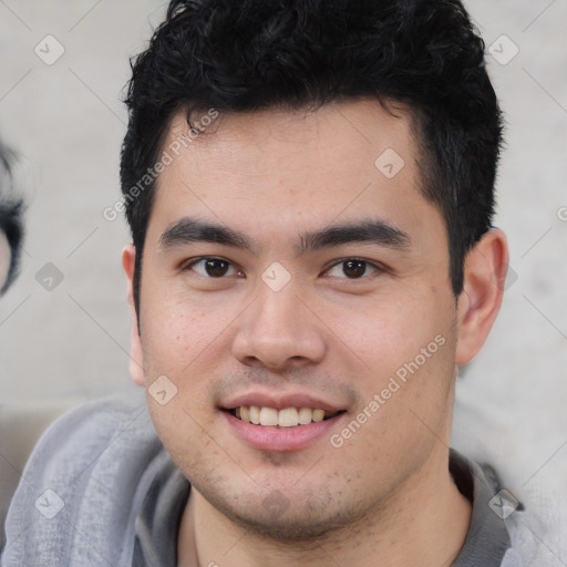 Joyful latino young-adult male with short  black hair and brown eyes