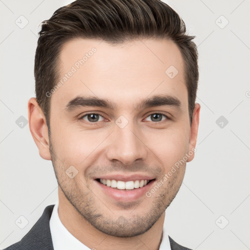 Joyful white young-adult male with short  brown hair and brown eyes