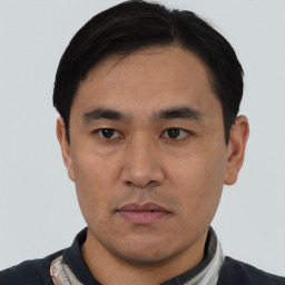 Neutral asian young-adult male with short  black hair and brown eyes