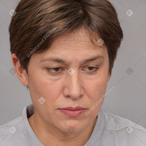 Joyful white adult female with short  brown hair and brown eyes