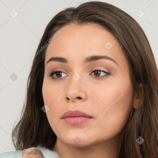 Neutral white young-adult female with long  brown hair and brown eyes