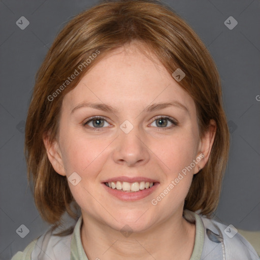 Joyful white young-adult female with medium  brown hair and blue eyes