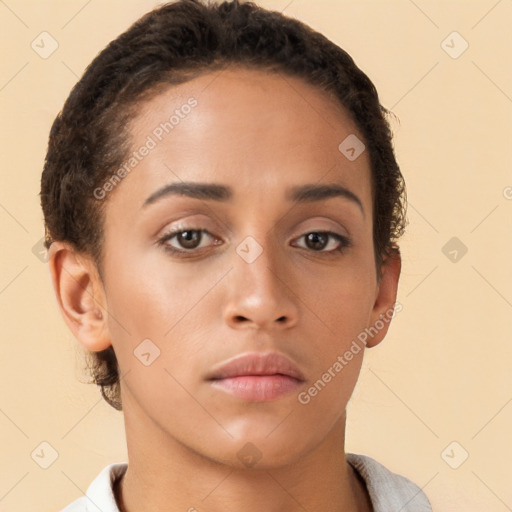 Neutral white young-adult female with short  brown hair and brown eyes