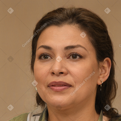 Joyful white adult female with medium  brown hair and brown eyes