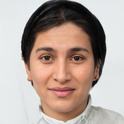 Joyful white young-adult female with short  brown hair and brown eyes