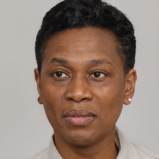 Neutral black adult male with short  black hair and brown eyes