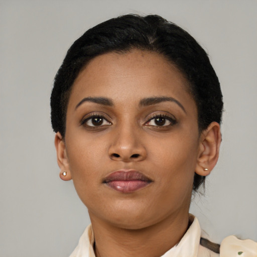 Neutral latino young-adult female with short  black hair and brown eyes