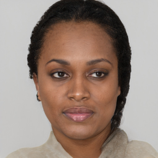 Neutral black young-adult female with short  black hair and brown eyes