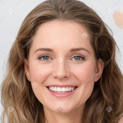 Joyful white young-adult female with long  brown hair and green eyes