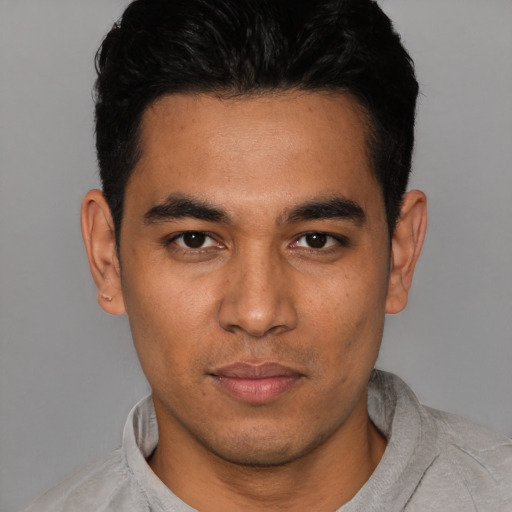 Neutral white young-adult male with short  black hair and brown eyes