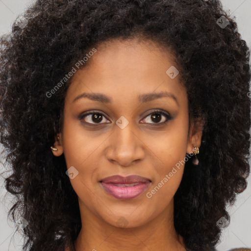 Joyful black young-adult female with long  brown hair and brown eyes