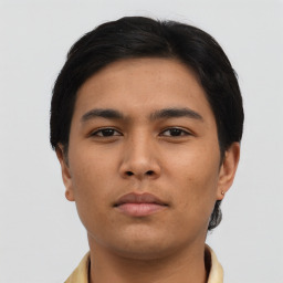 Neutral asian young-adult male with short  brown hair and brown eyes