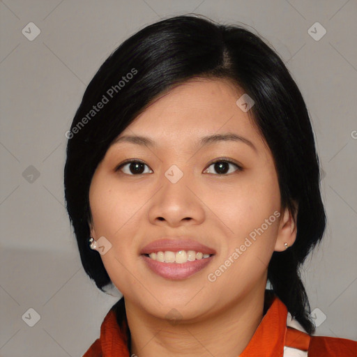 Joyful asian young-adult female with medium  black hair and brown eyes