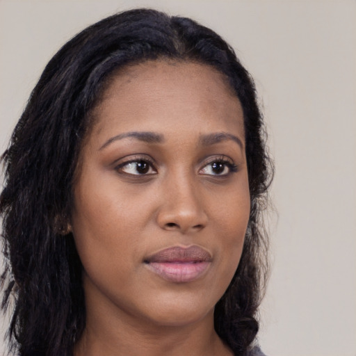 Joyful asian young-adult female with long  brown hair and brown eyes