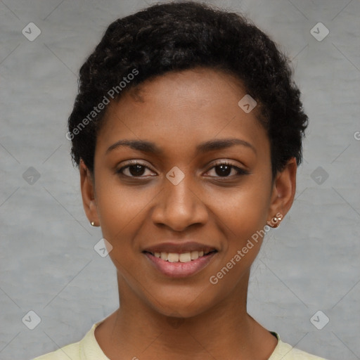 Joyful black young-adult female with short  black hair and brown eyes