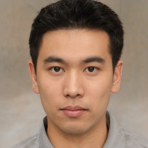 Neutral asian young-adult male with short  black hair and brown eyes
