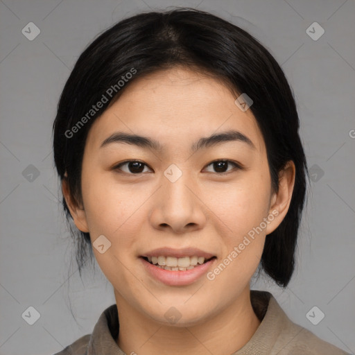 Joyful asian young-adult female with medium  black hair and brown eyes