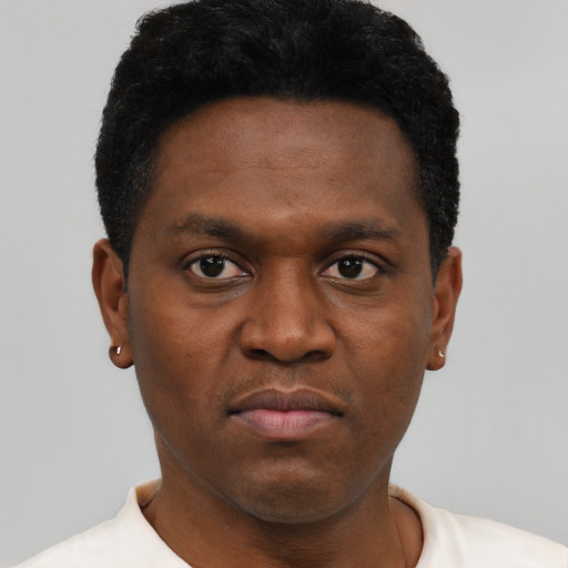 Neutral black young-adult male with short  black hair and brown eyes